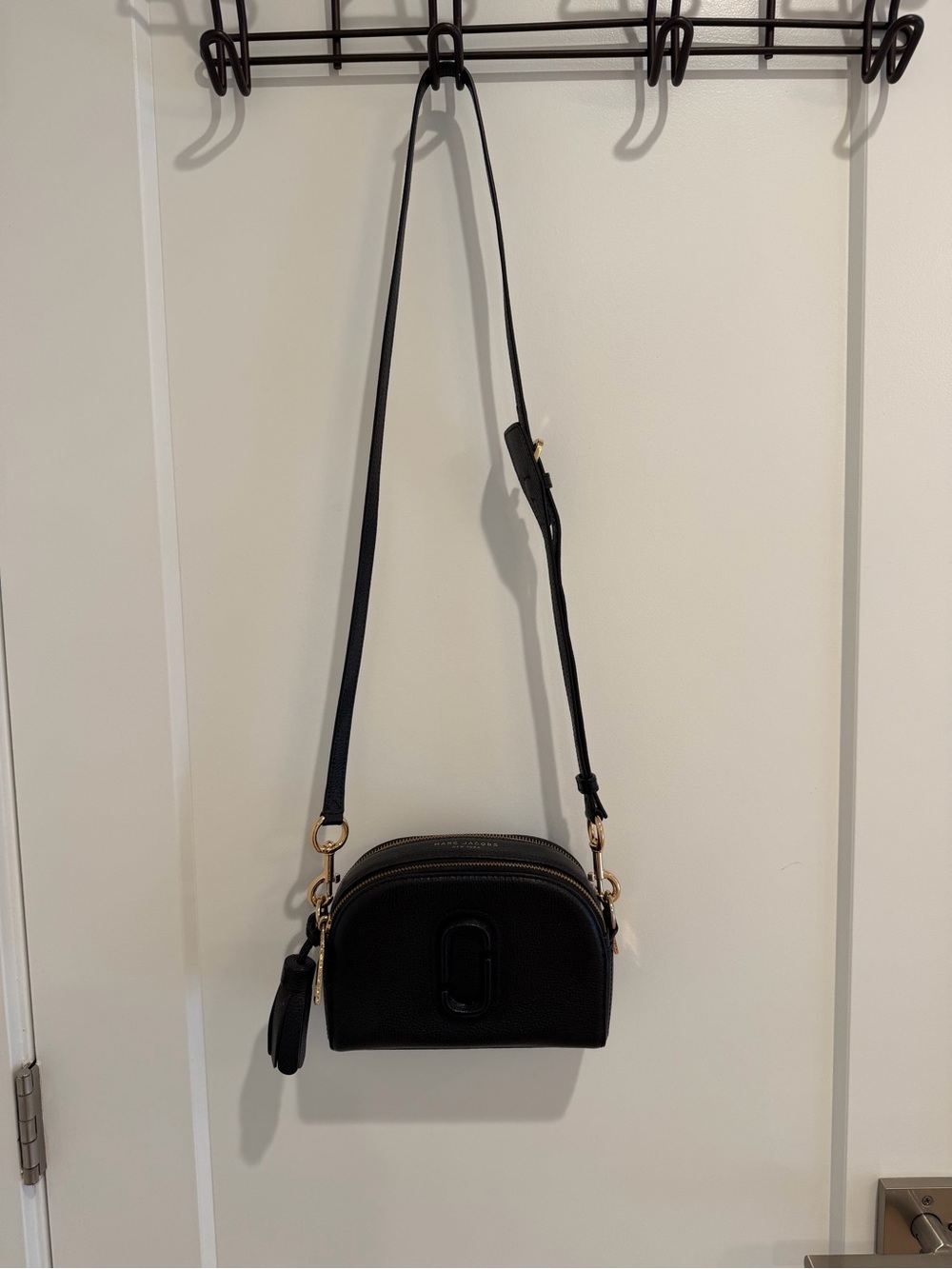 Marc Jacob’s Black Leather Crossbody Bag with Gold Hardware